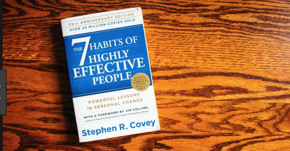 7 habits of highly effective people review book on wooden table